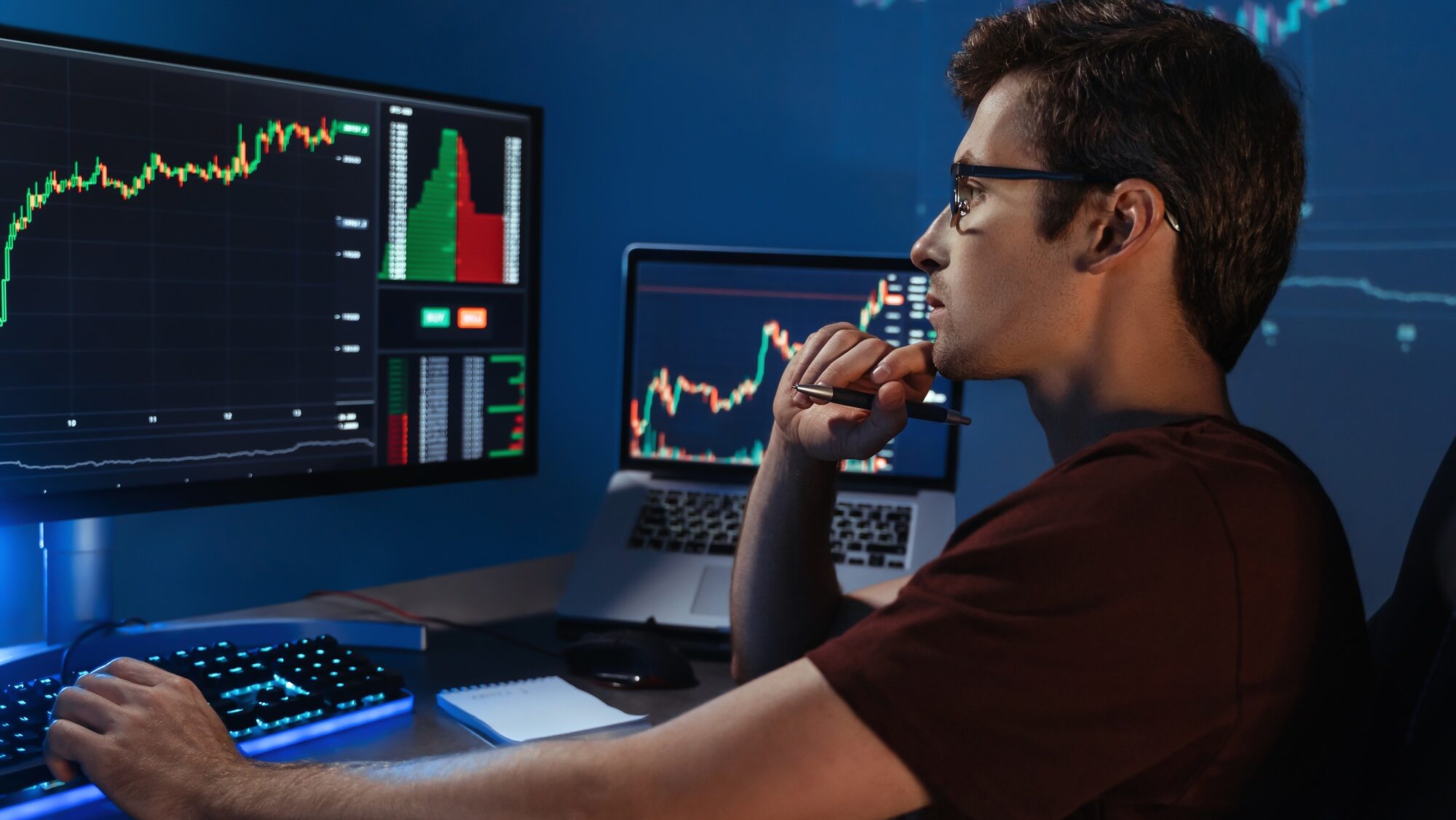 Smart crypto expert analyzing trading market chart, adjusting strategy of investments